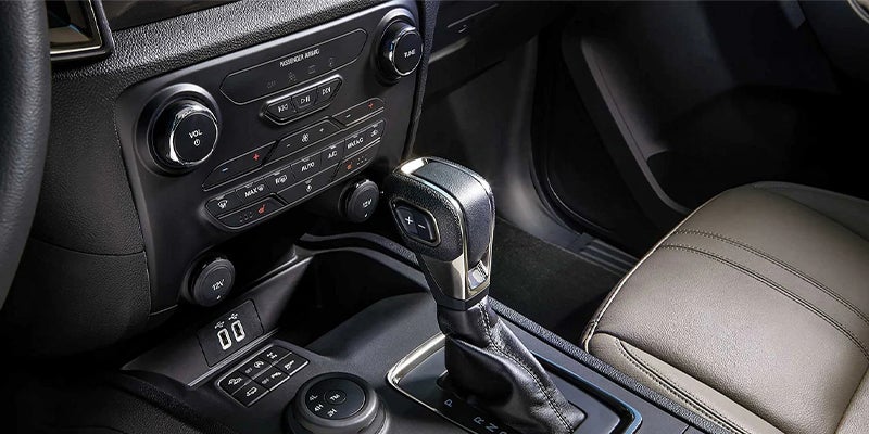 Touchscreen display showing smartphone integration apps